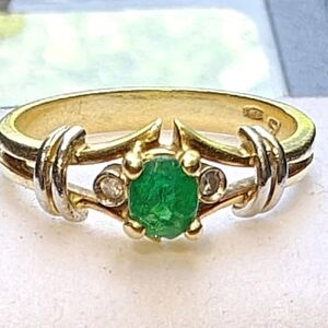 Elegant Gold and Silver Ring with Green Gemstone